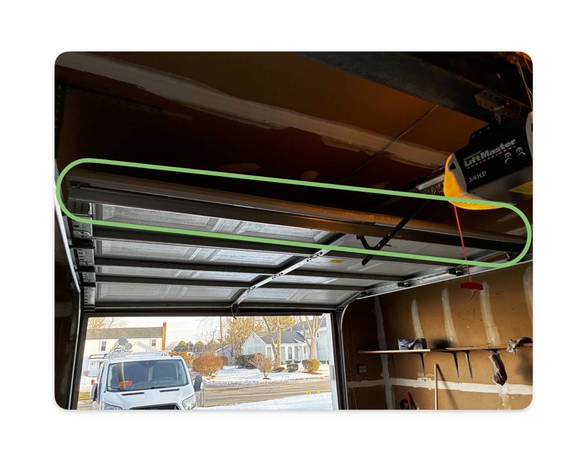 Garage door 8 ft steel strut installation for structural support