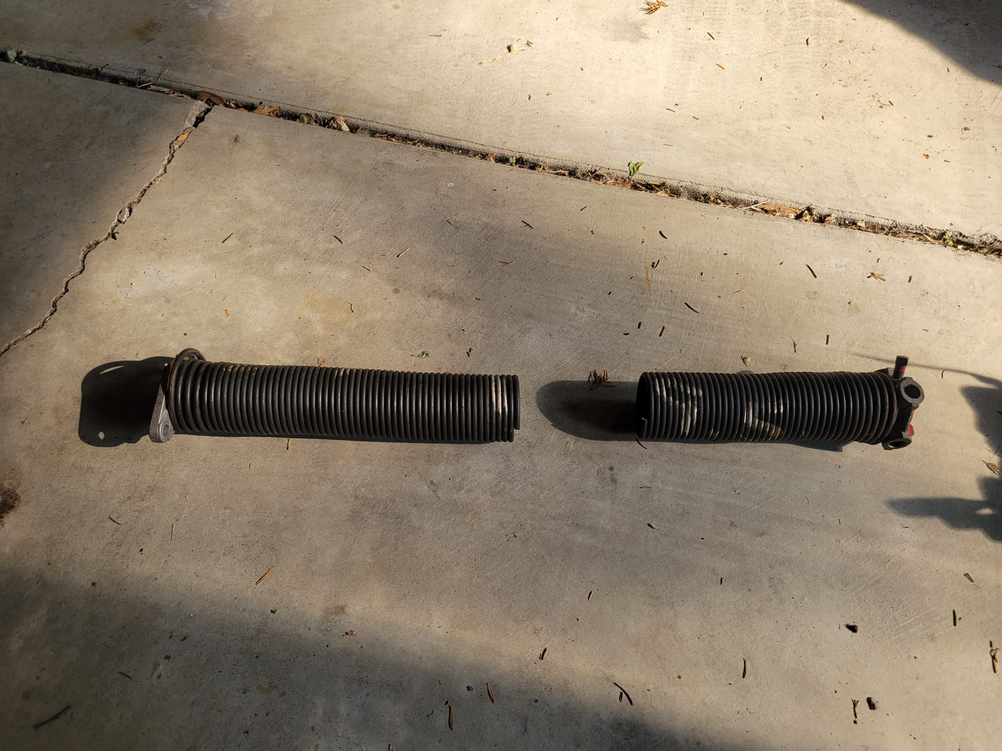 Broken garage door spring before replacement