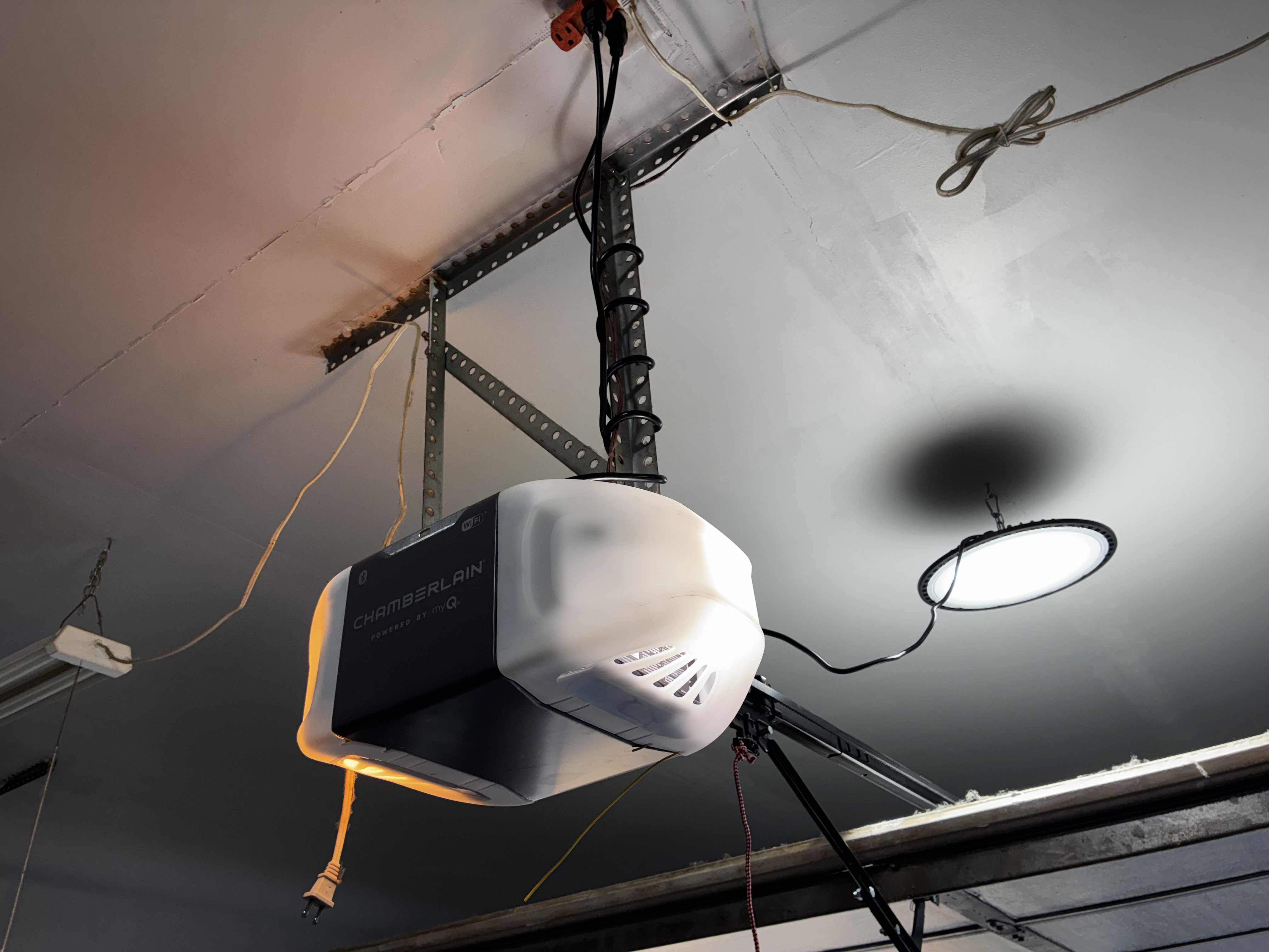 Old garage door opener before new opener installation