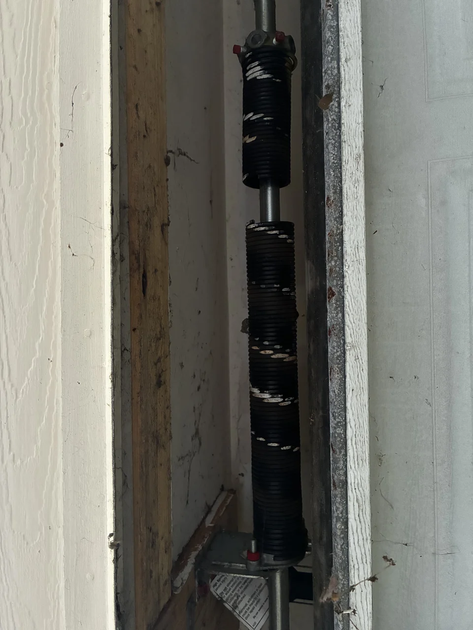 Broken garage door spring before replacement