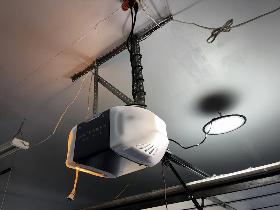 Old garage door opener before new opener installation