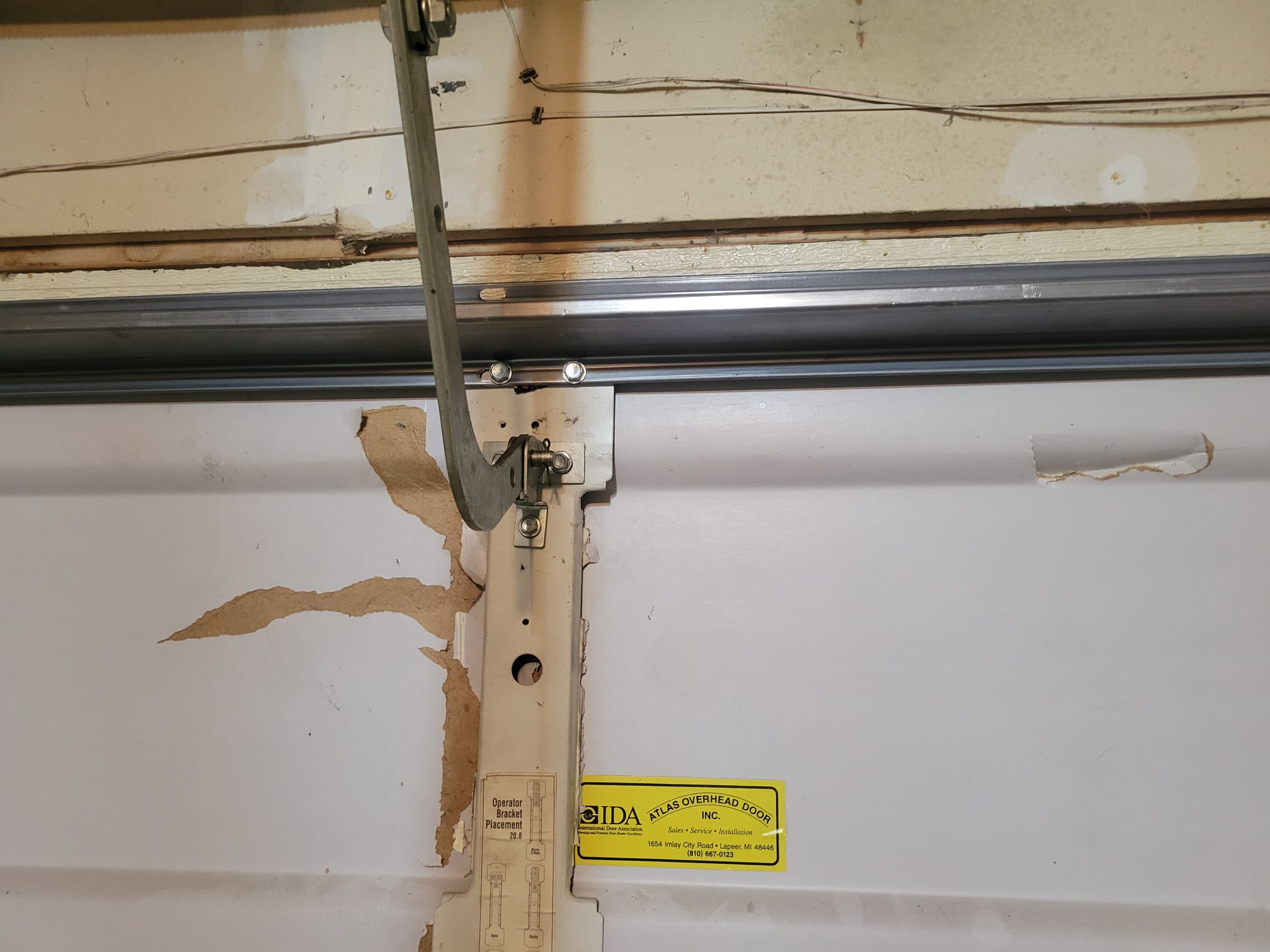 New garage door support bracket installed